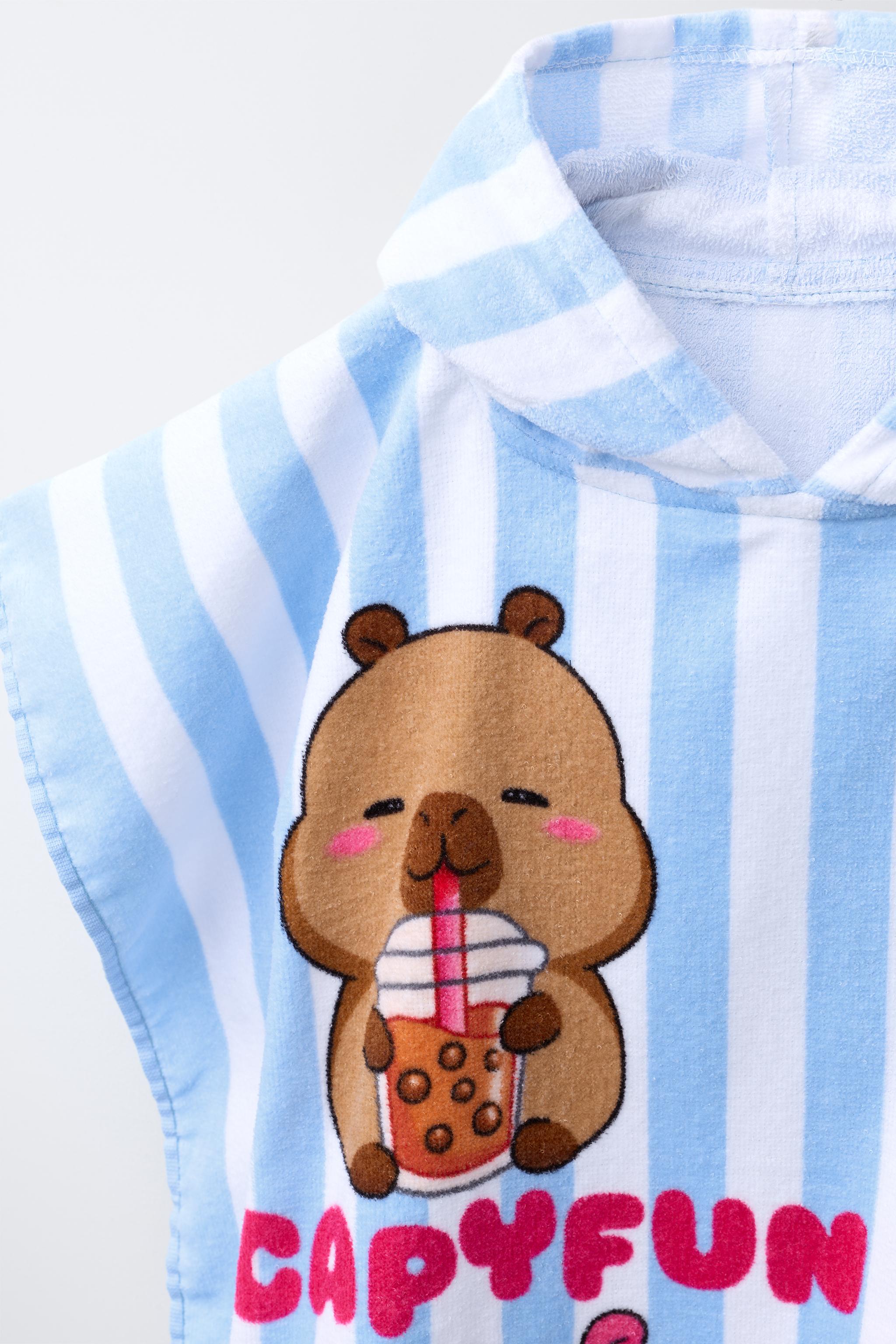 PONCHO SERVIETTE RAYURES CAPIBARA CAPYFUN ©